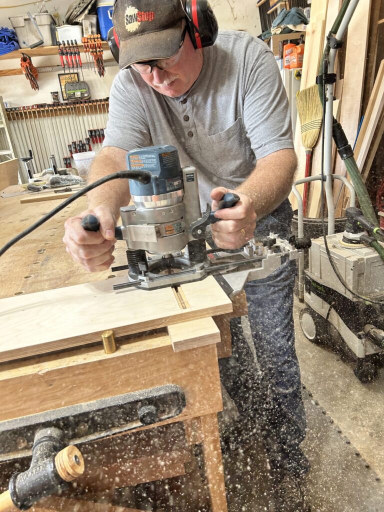 Routing a narrow slot in the base for the T-bolts